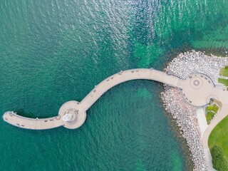 Top view of the Brant Street Pier on the rocky shore of Lake Ontario