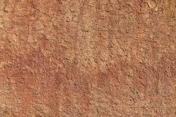 Fondo con detalle y textura de superficie rugosa y formas terrosas, con degradado de tonos marron