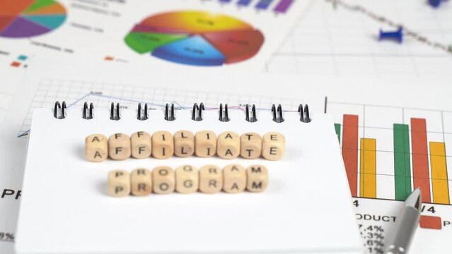 Business concept. Moving the camera from the bottom up to the cubes with the inscription - Affiliate program