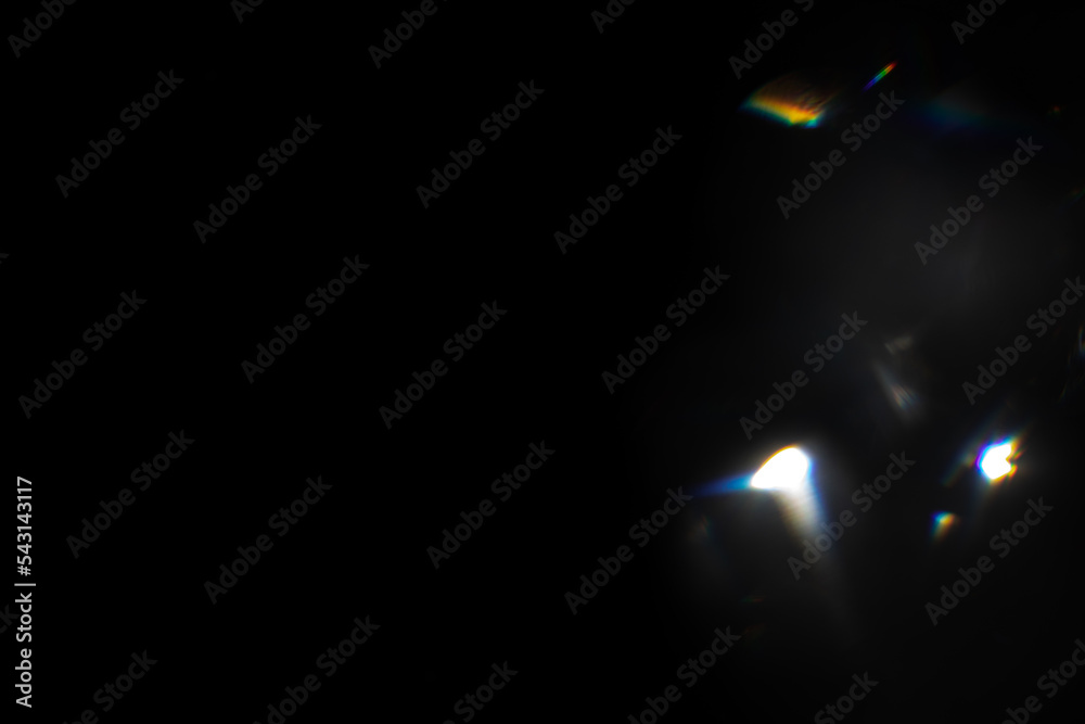 Wall mural blur colorful rainbow crystal light leaks on black background. defocused abstract multicolored retro
