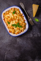 American mac and cheese, macaroni pasta in cheesy sauce