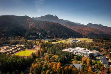 Aerial view of the Zakopane town uder Tatra mountains at autumn. Poland - obrazy, fototapety, plakaty