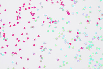 Fototapeta na wymiar sparkles hearts on white background with text place - Image