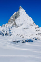 Fototapeta na wymiar Matterhorn is a mountain in the Pennine Alps on the border between Switzerland and Italy
