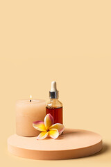 Spa and welness centre concept. Still life composotion with natural dropper bottle, frangipani...