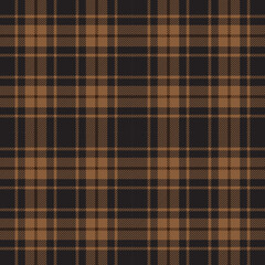 Brown and black tartan plaid. Scottish pattern fabric swatch close-up. 