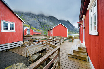 Fishing village with traditional red rorbu in Nusfjord, Lofoten, Norway