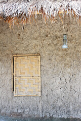 Details of the mud house window - traditional Vietnamese house in Trang An. 