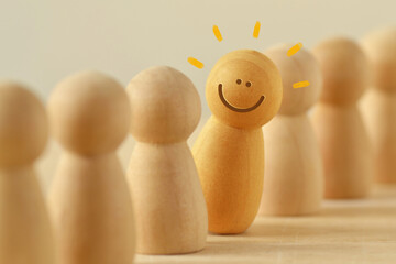 Happy pawn among a row of pawns  - Think different and standing out from crowd concept - 543155371