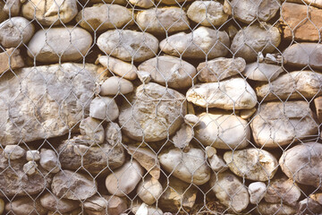 Stone wall with net