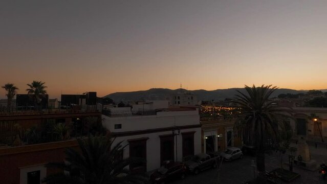Timelapse of downtown Oaxaca with a view to the mountains.