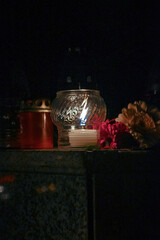 day of the dead red white candles in glass