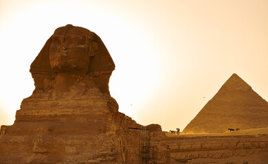 Fototapeta na wymiar Beautiful wide angle travel view of the Sphinx landmark in Giza pyramid complex from Cairo, Egypt.