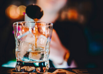 woman hand bartender making cocktail in bar
