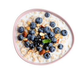 Tasty oatmeal porridge with blueberries on white background, top view. Healthy meal