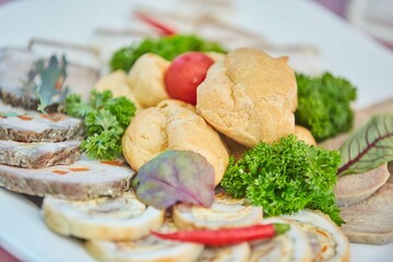 Assorted meat cuts on the festive table.