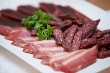 Assorted meat cuts on the festive table.