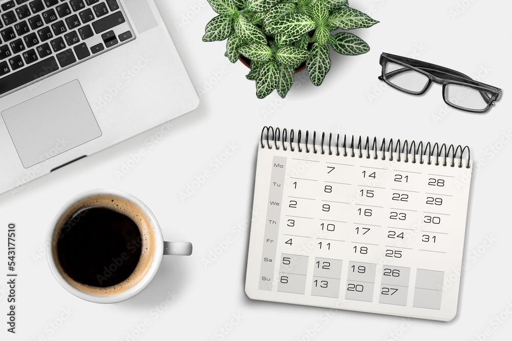 Poster Desk calendar and coffee cup on office table