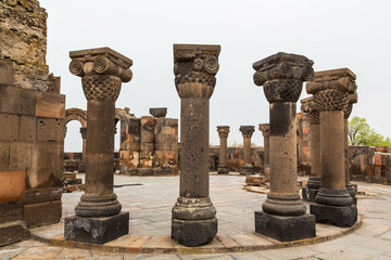 Fototapeta premium Columns and ruins of the ancient Zvartnots temple, a landmark of Armenia. Zvartnots, Armenia