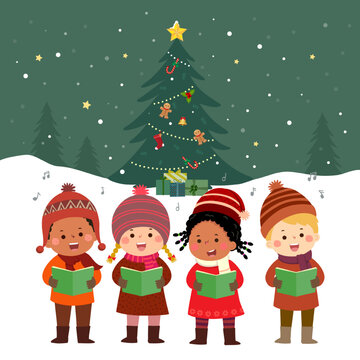 Happy kids singing Christmas Carols with Christmas tree