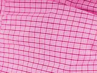 The texture of the fabric is in the form of a pink cell with iridescences. Almost flat