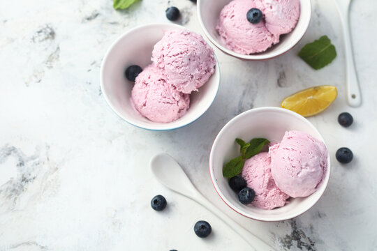 Homemade blueberry ice cream with lemon