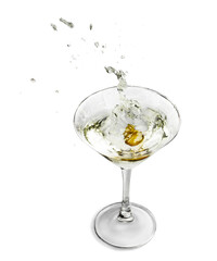 Green Olive Splashing in a Cocktail Glass