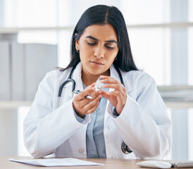 Woman with medication prescription, health and doctor in hospital office, focus and reading...