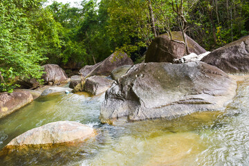 Naklejka na ściany i meble sunlight beauty nature and rock waterfall in south Thailand