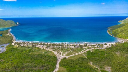 Aerial view of the beautiful sunny Bahia de Patanemo beach in Puerto Cabello, Venezuela