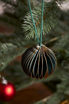 closeup of green decoration and ornaments for christmas tree