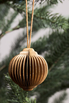 closeup of gold decoration and ornaments for christmas tree