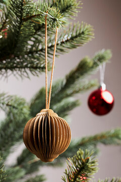 closeup of gold decoration and ornaments for christmas tree