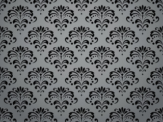 Obraz premium Wallpaper in the style of Baroque. Seamless vector background. Black and gray floral ornament. Graphic pattern for fabric, wallpaper, packaging. Ornate Damask flower ornament