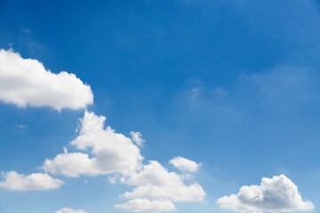 White clouds and blue sky background on daylight