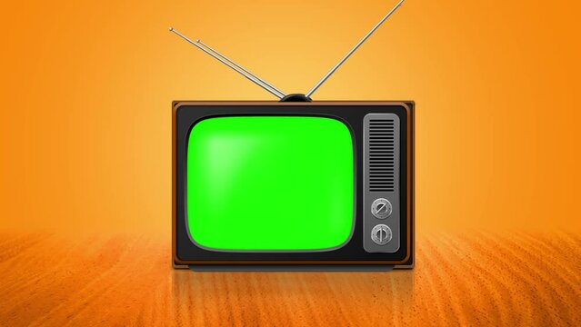 Retro old television Green Screen vintage style on orange background. old fashioned TV with grainy noise screen in  wooden floor. 4k video