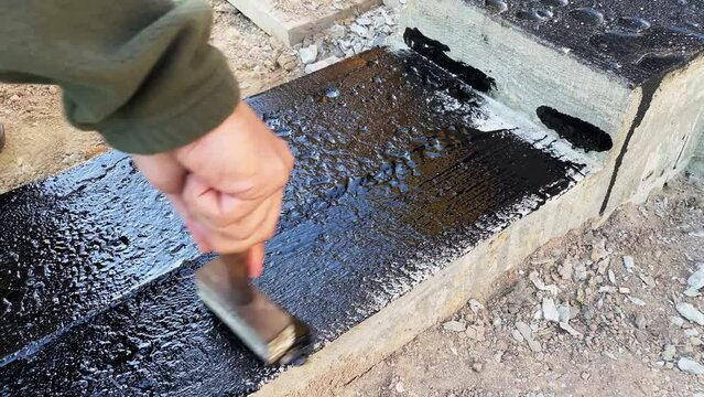 4k video slow motion foundation waterproofing construction works.