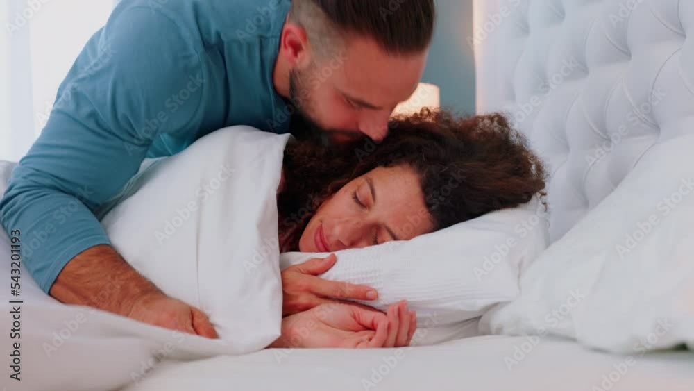 Sticker Morning kiss, couple and sleeping woman with a man showing care, love and resting. Girlfriend in a home bedroom bed busy with sleep or afternoon nap rest with a boyfriend leaving the house