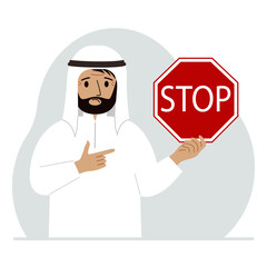 A man holds a red stop sign in his hand.