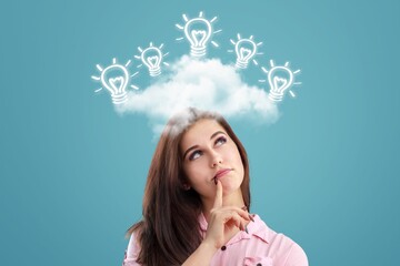 Happy young woman with cloud and lamp image
