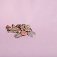 4.  Colorful stones on a pink background