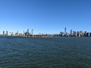 Fototapeta premium New York City & Jersey City from Ellis Island, New York, NY - October 2022