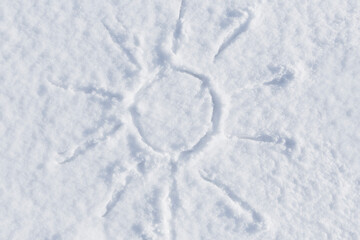 drawing of sun on white snow