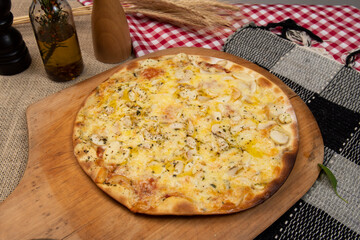 Brazilian pizza with mushroom, cheese and oregano