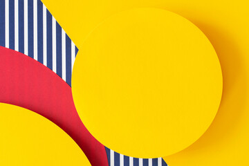 Abstract trendy fashion colored papers texture background in memphis geometry style. Yellow, red,...