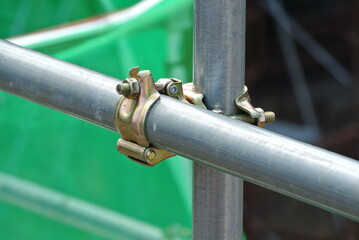 SELANGOR, MALAYSIA -FEBRUARY 26, 2015: Scaffolding connector detail at the construction site. The...