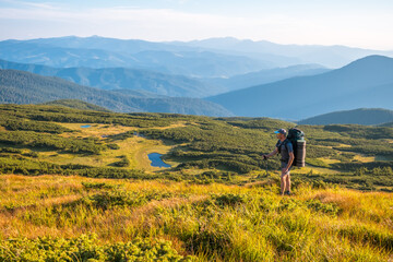 Backpacker in mountains, Summer Tatra mountain landscape