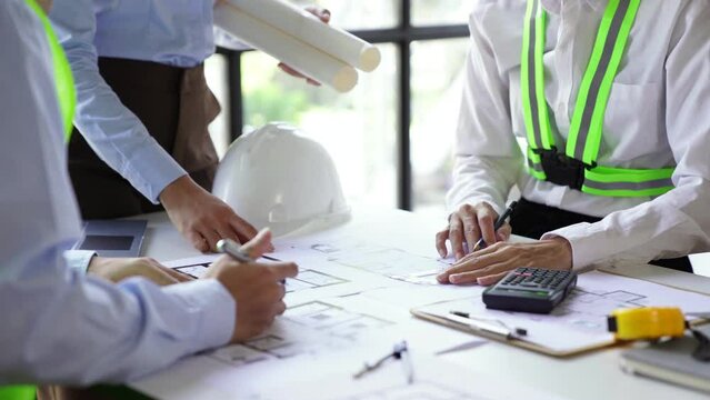 Architecture Engineer Teamwork Meeting, Drawing and working for architectural project and engineering tools on workplace, concept of worksite on technical drawing structure and construction.