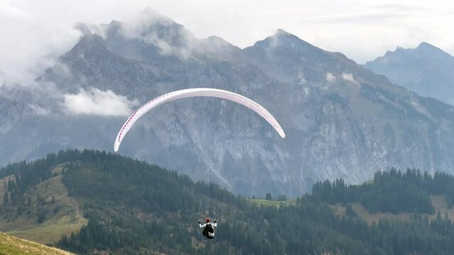 Paragliding from the Chli Aubrig summit, Canton Schwyz, Switzerland
