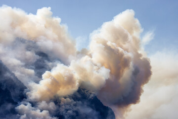 BC Forest Fire and Smoke over the mountain near Hope during a hot sunny summer day. British...